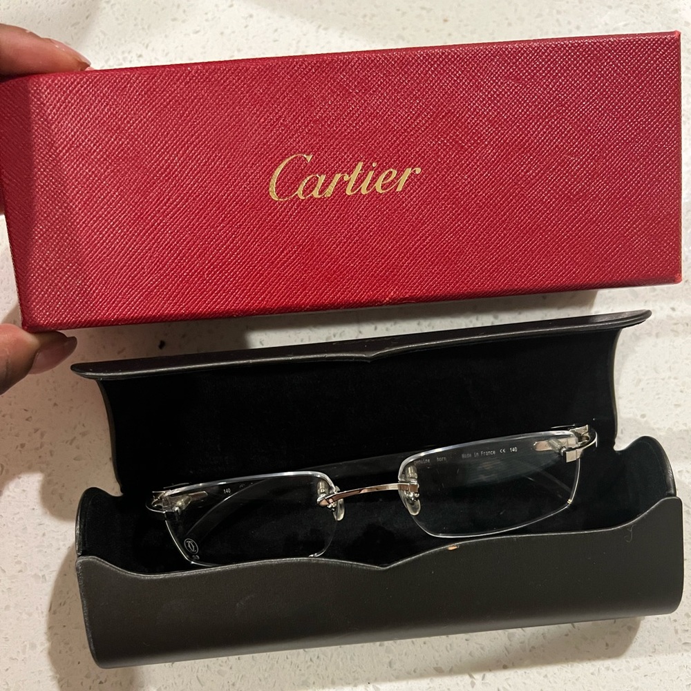 Cartier Eyewear
rimless square-frame glasses